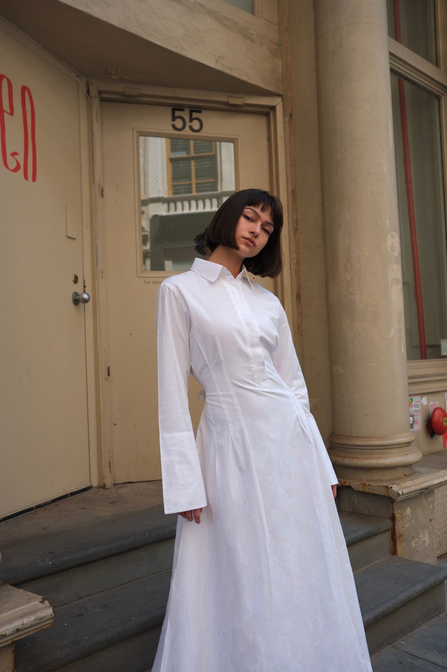 a white cotton maxi dress with long sleeve and cinched waist, modest dress sustainable