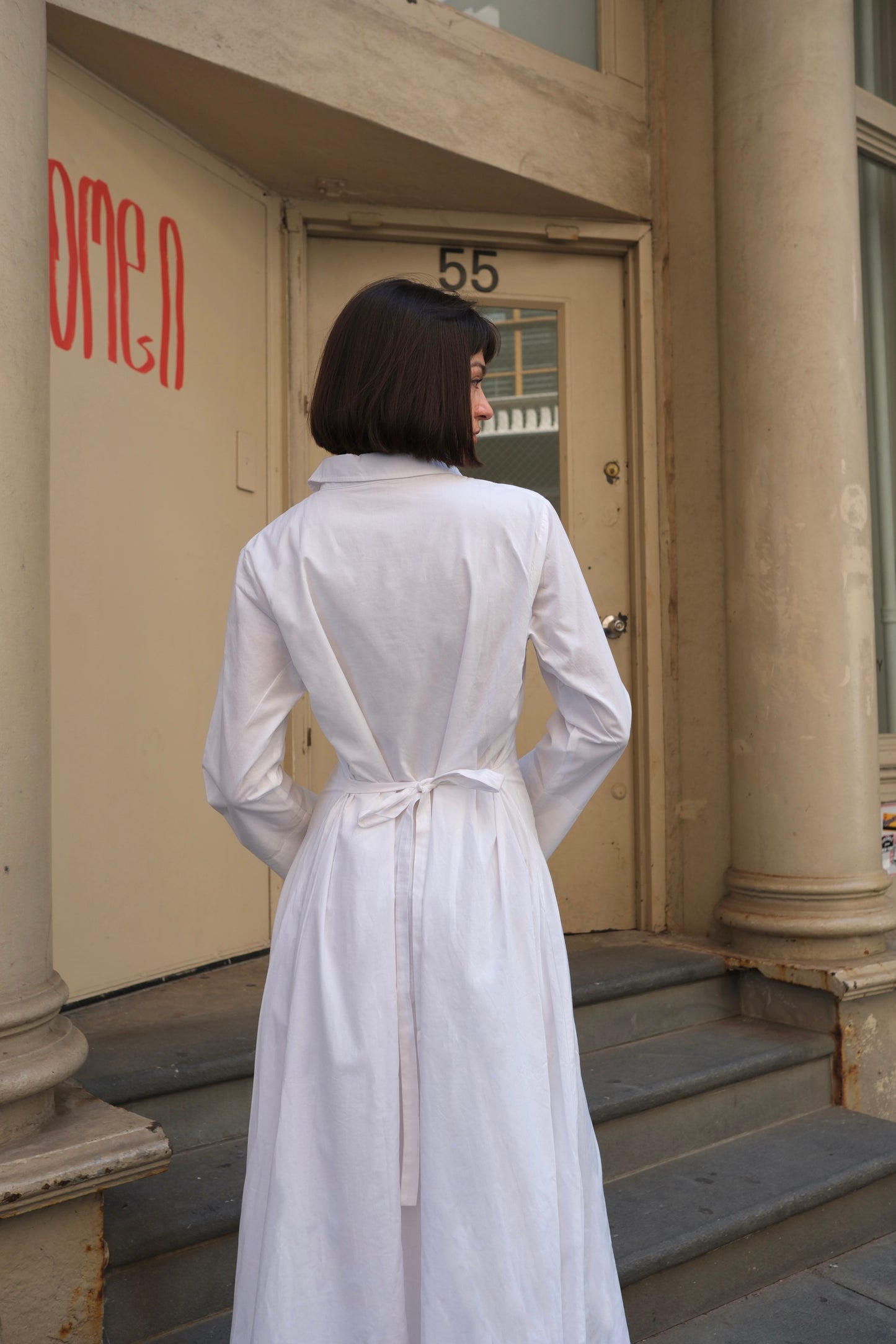 a white cotton maxi dress with long sleeve and cinched waist, modest dress sustainable