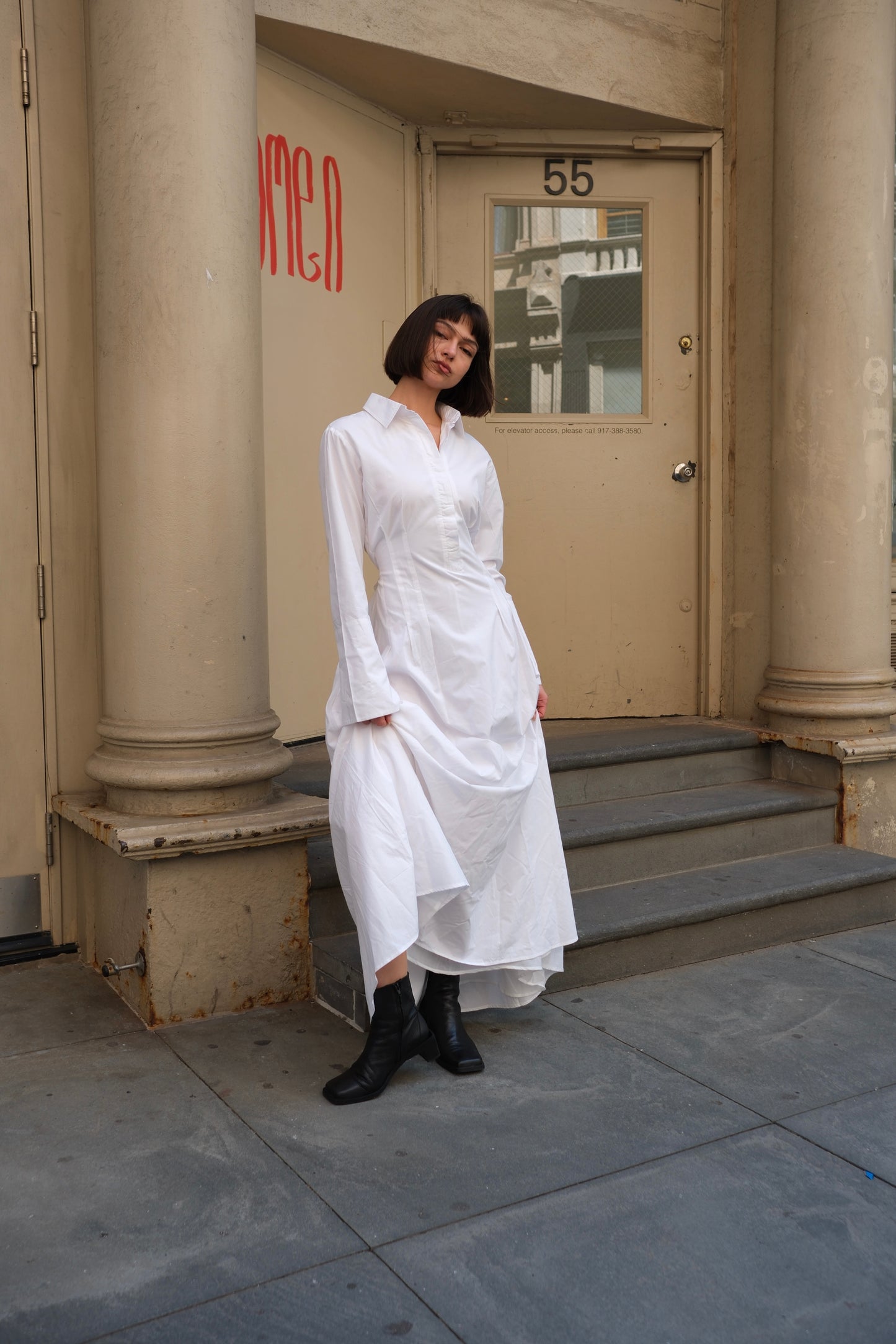 a white cotton maxi dress with long sleeve and cinched waist, modest dress sustainable